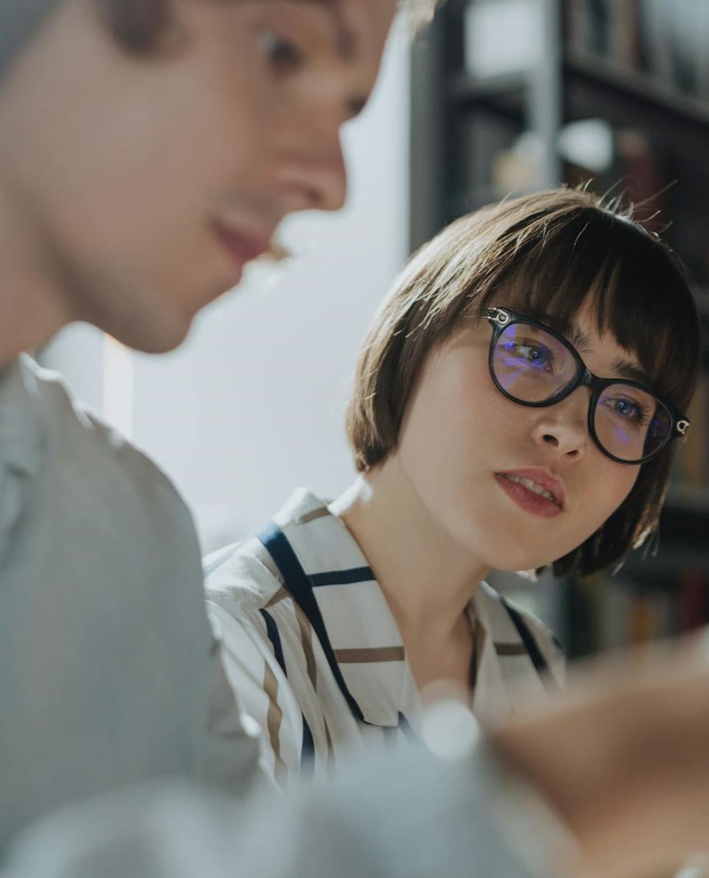 empty desk with white board in background containing biology diagram